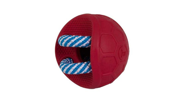 Interactive JW Fits All Treat Ball for dogs, dispensing treats while promoting dental health and engaging playtime.