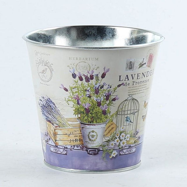 Lavender metal pot covers (11cm) in set of 3, perfect for stylishly showcasing small indoor plants.
