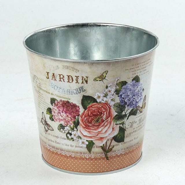 Charming Jardin Roses metal pot covers, 13.5CM high, set of 3 for stylish indoor and outdoor plant decor.