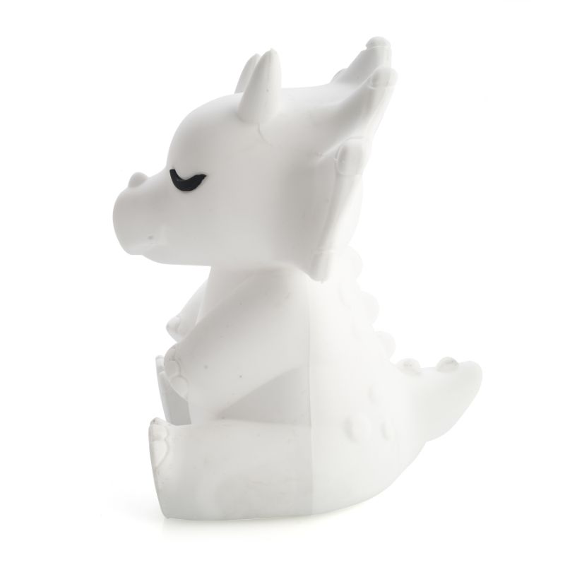 Soft touch triceratops LED night light with 6 brightness settings, rechargeable battery, and warm glow for children's bedtime.