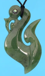 Greenstone Manaia Hook Pendant, intricately carved symbol of protection, on adjustable black cord, ideal for style and good fortune.
