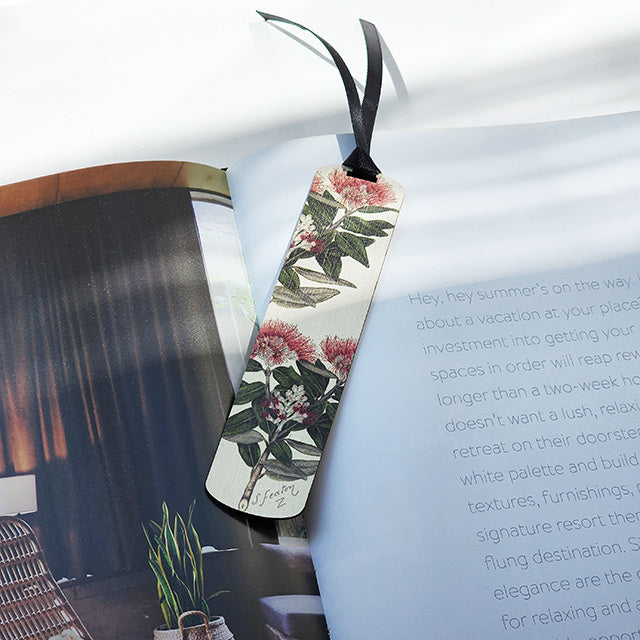 Greeting card featuring Pohutukawa artwork by Sarah Featon with a bamboo bookmark, perfect for sharing sentiments.