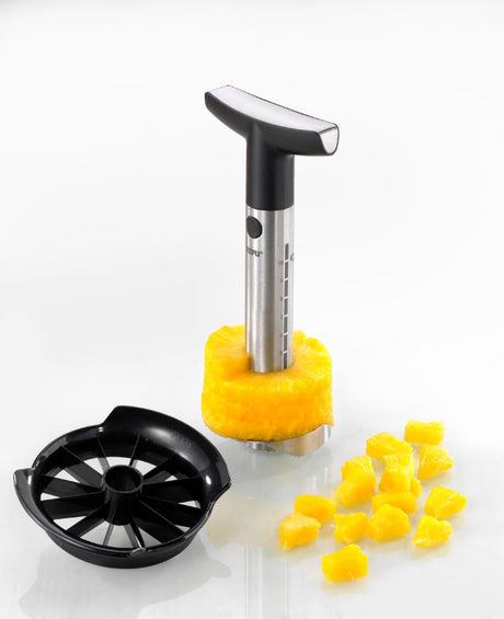 Gefu Professional Pineapple Slicer (24cm) with sharp blade, etched scale, and ergonomic grip for easy fruit slicing.