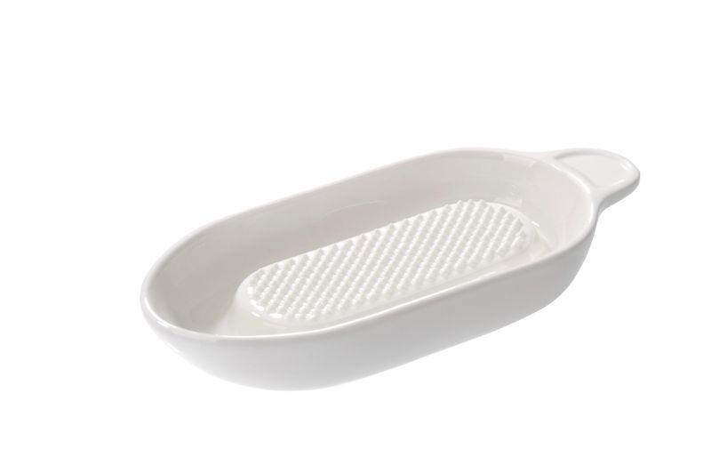 Ceramic ginger grater with sharp teeth, perfect for enhancing flavors in healthy dishes. Dishwasher safe and durable.