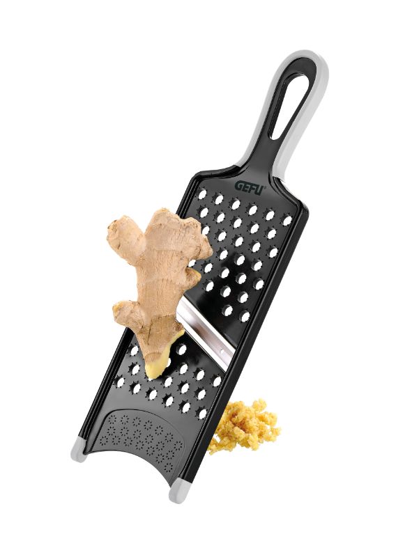 Ergonomic Gefu Asia Vegetable Slicer with Japanese steel blades, finger guard, and non-slip feet for effortless slicing.