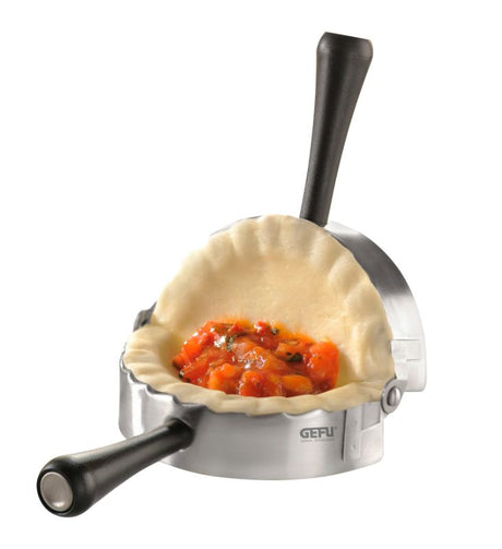 Ravioli mould for making fresh pasta, featuring ergonomic handles and high-grade stainless steel, 8cm size.