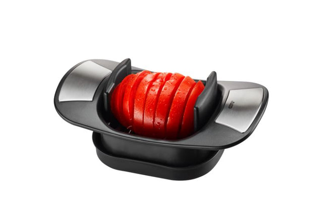 GEFU Caprese Tomato and Mozzarella Cutter with ergonomic handles and toothed blades for uniform 8mm slices, dishwasher safe.