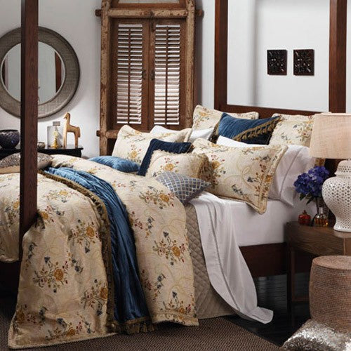 Elegant gold and linen quilt cover set with floral design, tailored flange, and luxurious comfort for a stylish bedroom retreat.