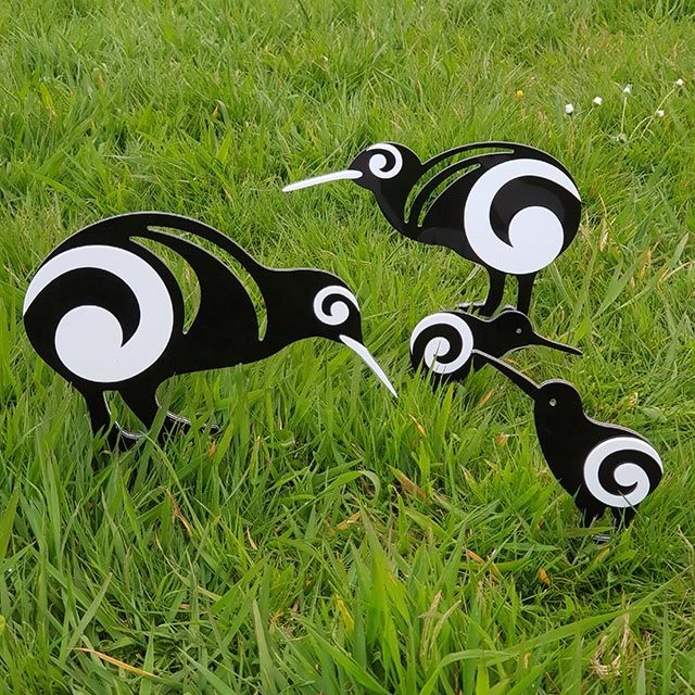 Whimsical kiwi family garden stakes set in vibrant colors, crafted from durable aluminium composite and acrylic for outdoor decor.