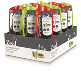 Compact Zeal Tower Grater in red or green, designed for mess-free cheese grating and easy serving.