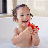 Vibrant crab and fish bath squirters for toddlers, promoting playful water fun and fine motor skill development.