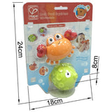 Colorful bath squirters shaped like a crab and fish for toddlers, designed for fun water play during bath time.