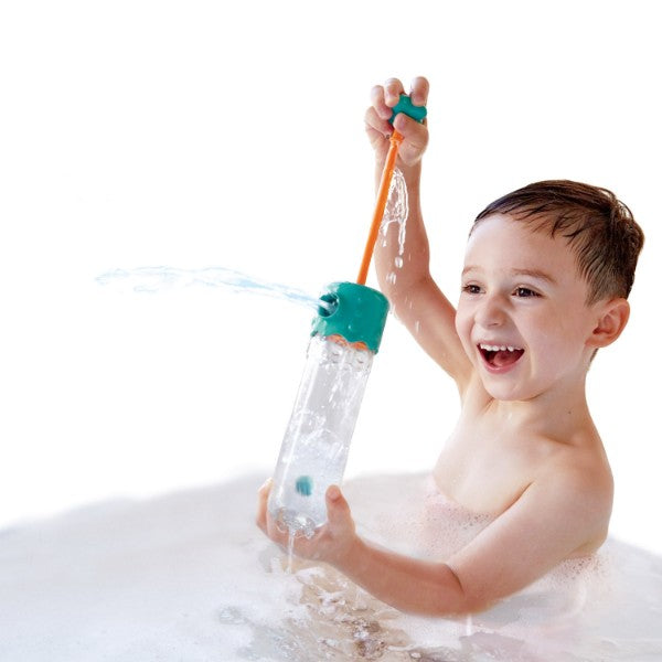 Colorful Hape Multi Spout Sprayer bath toy with four nozzles for exciting water play and sensory exploration.