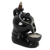 Black ceramic Tea Pot Backflow Incense Burner with an elegant teapot design, creating a soothing smoke waterfall effect.