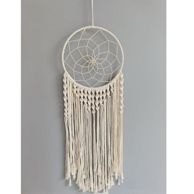 Handcrafted cream spiral dreamcatcher, 25cm, designed to filter negativity and enhance decor with elegance.