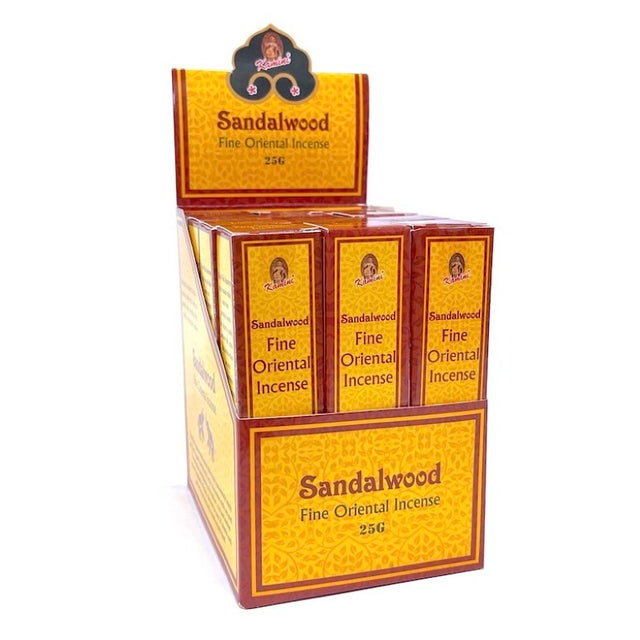 Kamini Sandalwood incense set of 12, featuring hand-rolled sticks and a ceramic burner for a calming ambiance.