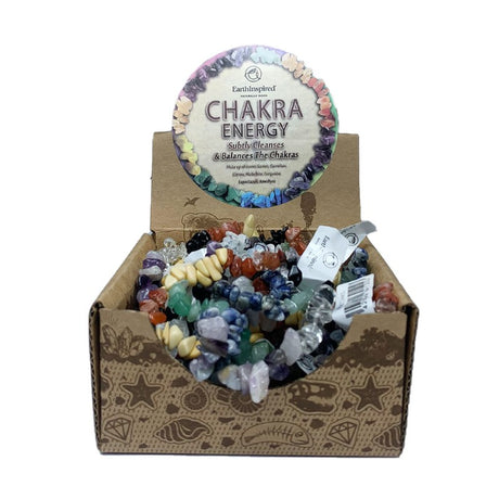 Retail-ready display box of 25 unique chakra crystal chip bracelets made from various gemstones for energy healing.