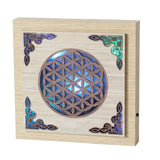 A mesmerizing Flower of Life LED plaque that changes colors, perfect for meditation and spiritual decor in any room.