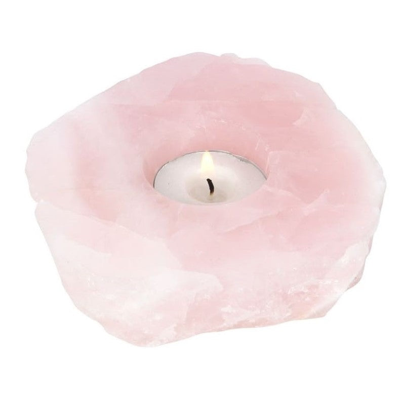 Rose Quartz Tealight Holder showcasing natural pink hues, promotes tranquility, ideal for meditation, fits one tealight, unique design.