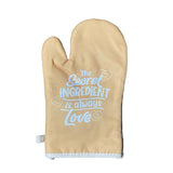 Stylish oven glove with "The secret ingredient is always love" for home cooks, made of polyester and cotton, safe up to 250°C.
