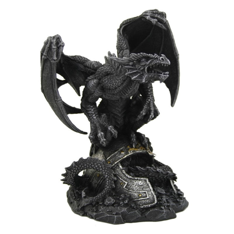 Intricately crafted black dragon figurine on a battlefield, poised for attack, perfect for fantasy collectors.