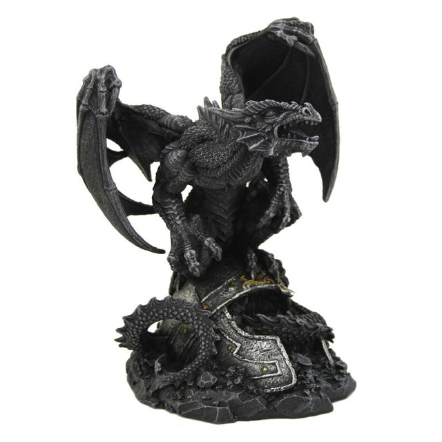 Intricately crafted black dragon figurine on a battlefield, poised for attack, perfect for fantasy collectors.
