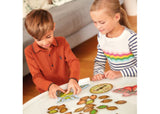 Family board game featuring colorful bugs, encouraging teamwork and fine motor skills for ages 3 and up.