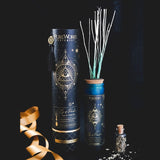 Ombre glass diffuser with cork top, sage and white tea scent, charm tassel, and willow sticks for mindfulness and tranquility.
