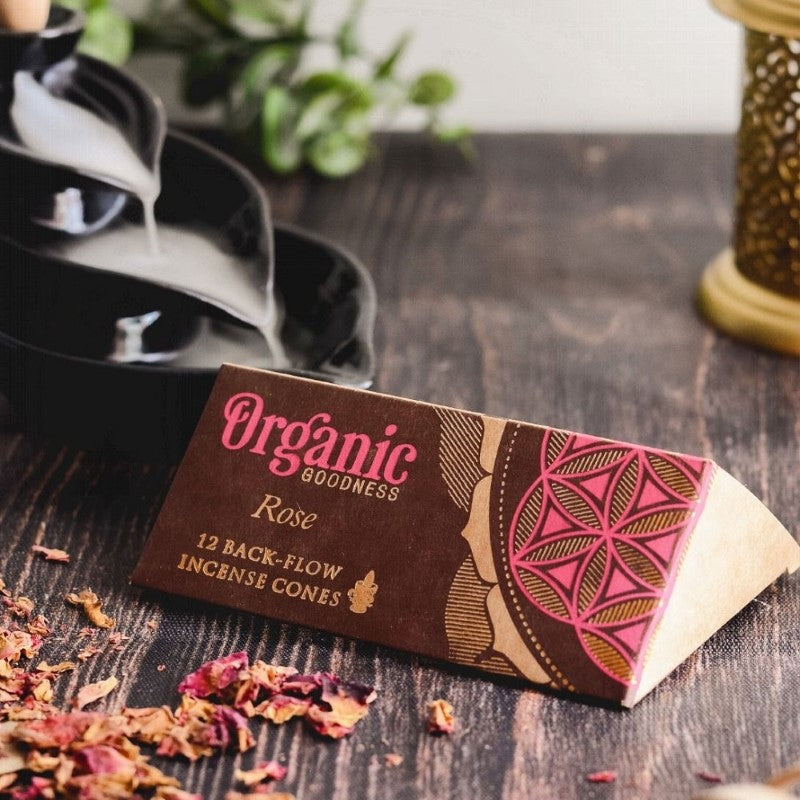 Handmade backflow incense cones in rose scent, crafted from organic materials, promoting relaxation and supporting children's education.
