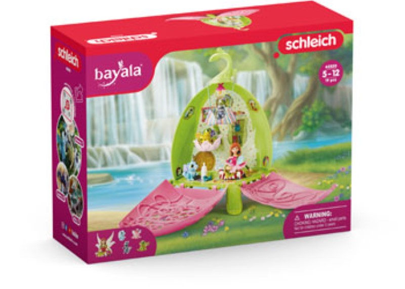 Colorful playset featuring Marween the sun fairy, baby dragons, and a raccoon in a magical nursery for imaginative play.