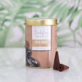 Set of 6 handmade Palo Santo backflow incense cones in stylish tins, designed for soothing aromas and impressive smoke displays.