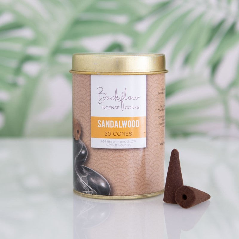 Set of 6 sandalwood backflow incense cones in tins, designed for calming ambiance and mesmerizing smoke cascades.