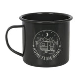 Black enamel camping mug featuring a retro caravan illustration, perfect for outdoor adventures and cozy campfire drinks.