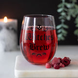 Witches Brew Stemless Wine Glass featuring gothic 'Witches Brew' text, perfect for wine or potions, with a 500ml capacity.