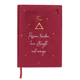 Burgundy velvet notebook with 'Passion, freedom, love' text and starry sky design, perfect for fire signs' creativity.
