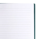 Green velvet notebook showcasing earth zodiac traits, featuring inspiring words and a starry sky design on the back.