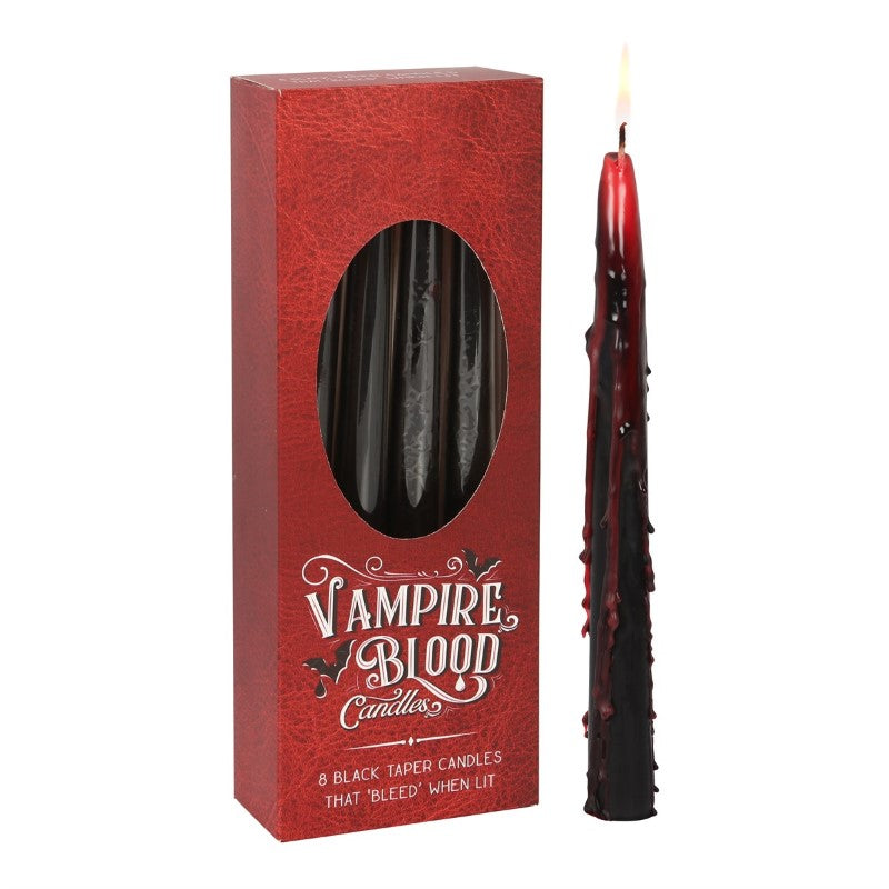 Box of 8 Vampire Blood Taper Candles featuring a bleeding wax effect for gothic decor and haunting ambiance.