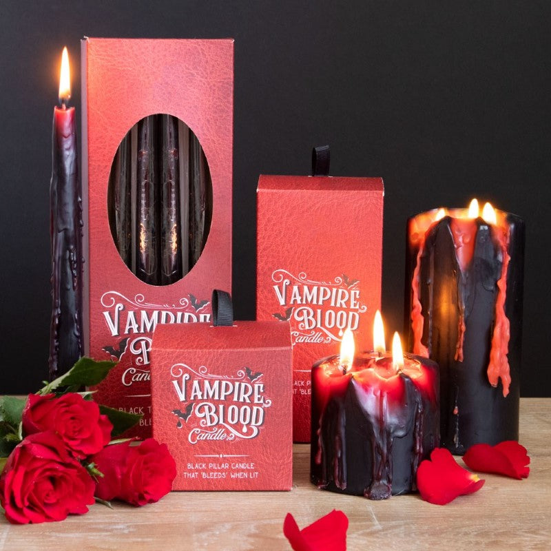 Box of 8 Vampire Blood Taper Candles with bleeding wax effect, perfect for gothic decor and creating a haunting ambiance.