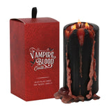 Large red pillar candle with a bleeding wax effect, perfect for gothic home decor and creating eerie ambiance.