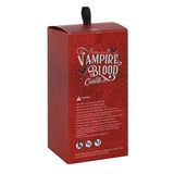 Large blood-red pillar candle with a bleeding wax effect, perfect for gothic decor and Halloween ambiance.