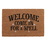 Natural coir doormat with the phrase 'Welcome, Come In For A Spell' and white stars, perfect for witch-themed decor.