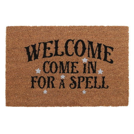 Natural coir doormat with the phrase 'Welcome, Come In For A Spell' and white stars, perfect for witch-themed decor.