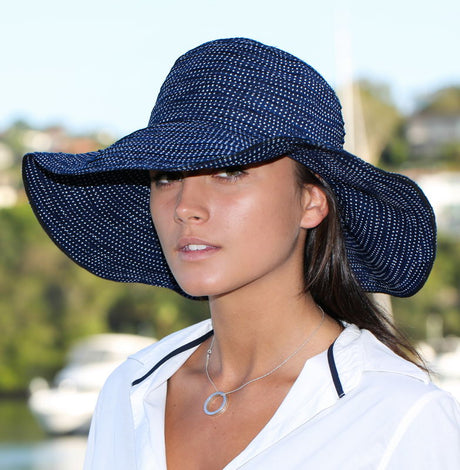 Navy Endless Summer Sun Hat with UPF 50+ protection, stylish design, and a comfortable fit for outdoor adventures.