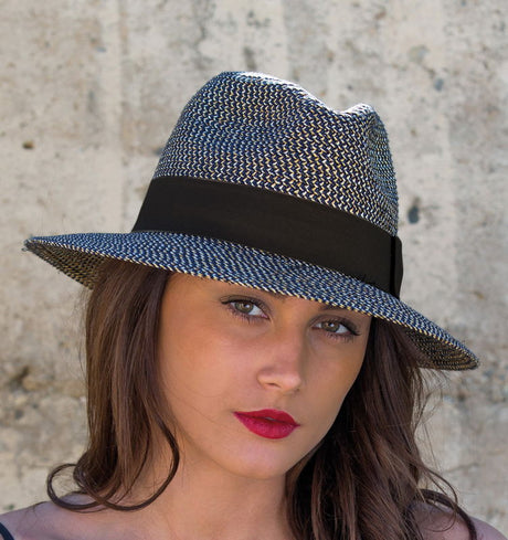 Contemporary navy fedora hat with black trim, providing UPF 50+ sun protection and a stylish unisex design for any occasion.
