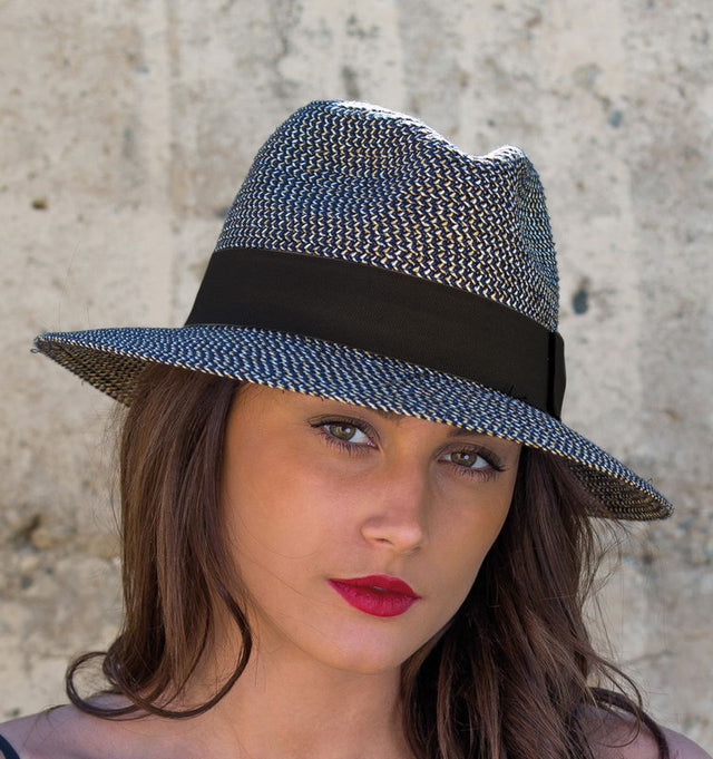 Contemporary navy fedora hat with black trim, providing UPF 50+ sun protection and a stylish unisex design for any occasion.