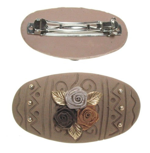 Plastic hairclip 85x50mm, versatile accessory for all hair types, securely holds hair while adding a stylish touch.
