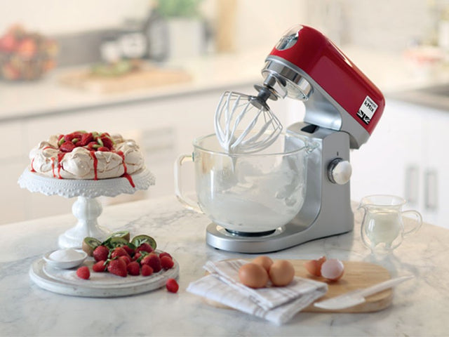 Kenwood kMIX Mixer 100W in Spicy Red, featuring versatile tools for effortless baking and cooking creativity.