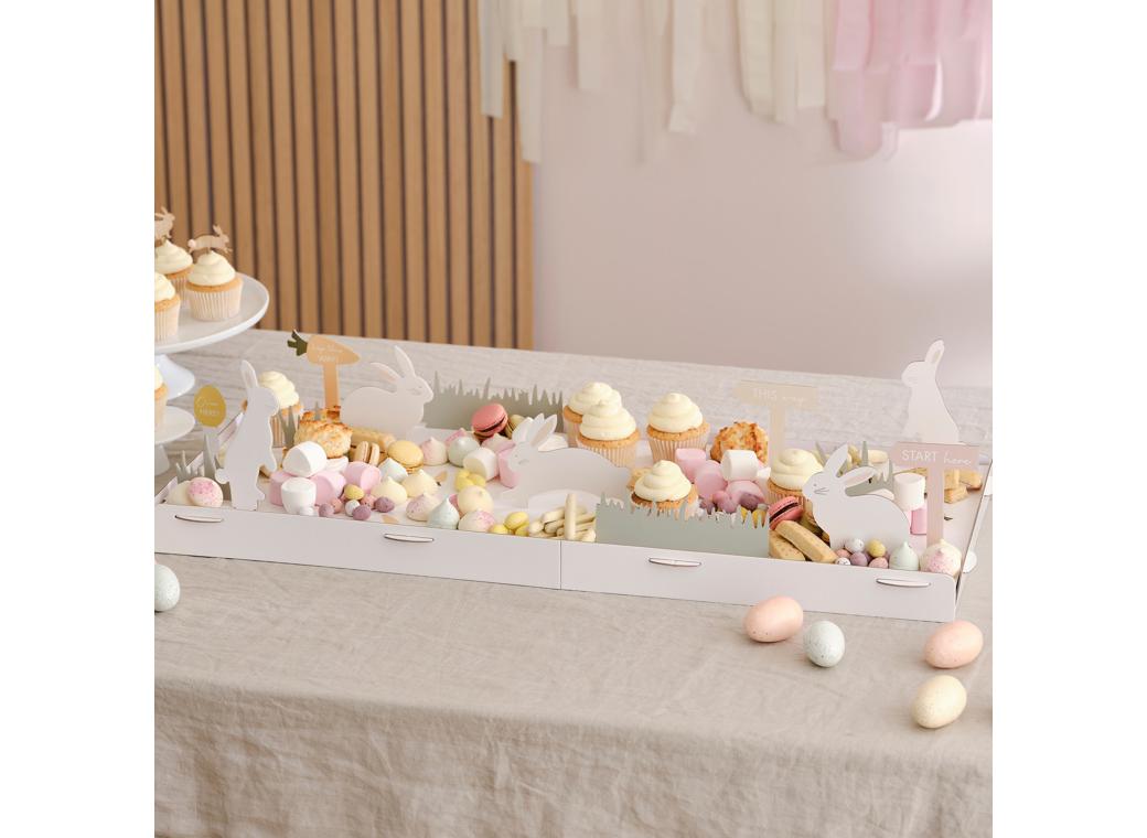 Vibrant Easter egg hunt scene grazing board, perfect for festive gatherings and showcasing delicious treats.