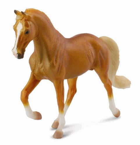 Golden palomino Tennessee Walking Horse stallion figurine, showcasing detailed craftsmanship and graceful stature, ideal for decor.