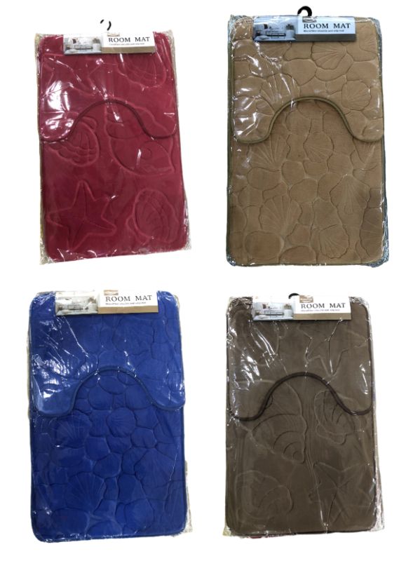 Plush assorted bath mats (78x50 cm) for comfort, style, and moisture absorption with non-slip backing for safety.